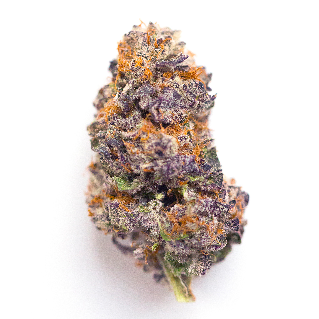 Grape Cream Cake cannabis flower from The Green Leaf Cannabis—Indica-dominant Hybrid strain with dense, trichome-coated buds in deep purple and green hues. Bursting with sweet grape, creamy vanilla, and earthy aromas, offering heavy, calming effects ideal for nighttime use and stress relief.
